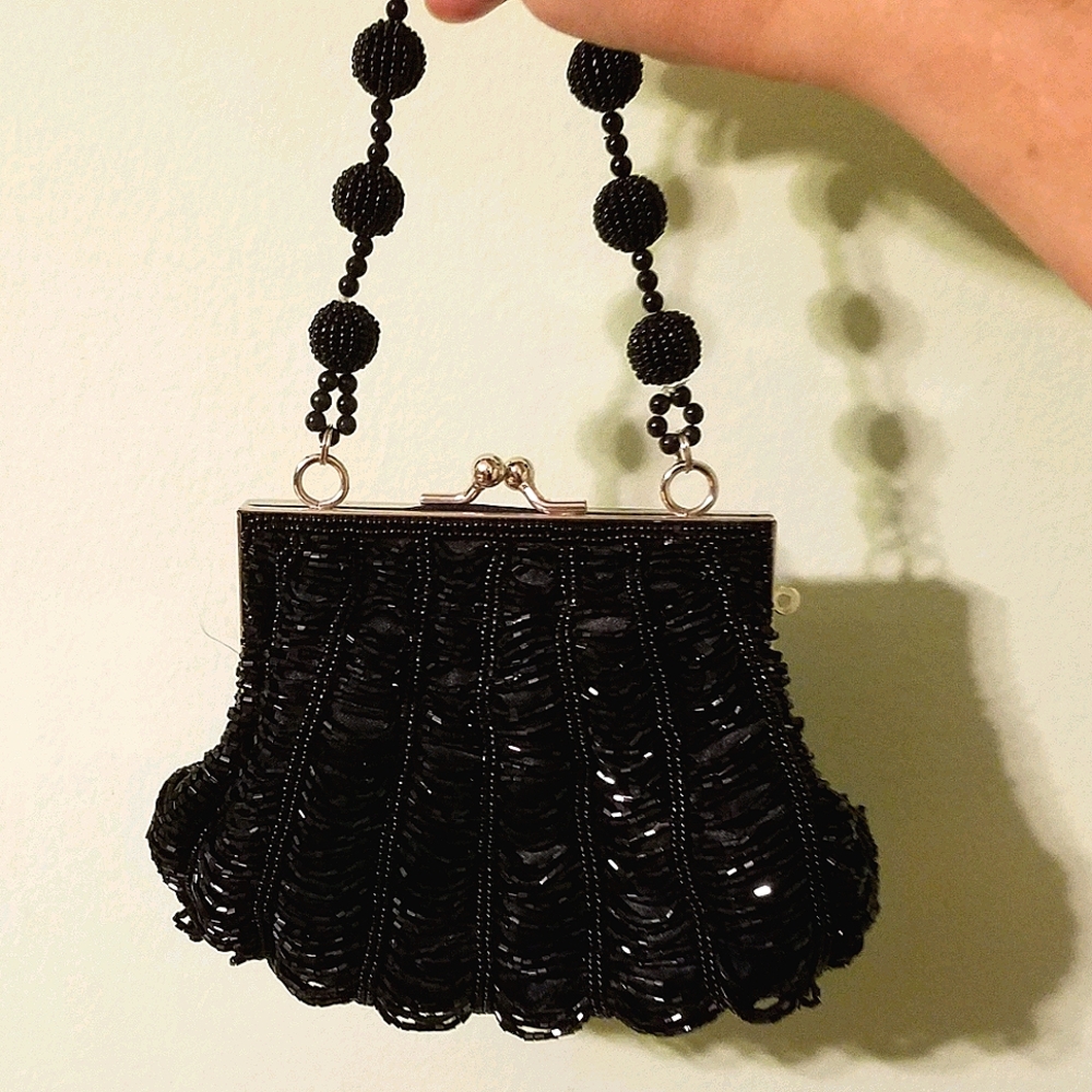 Beaded evening bag with beaded handle